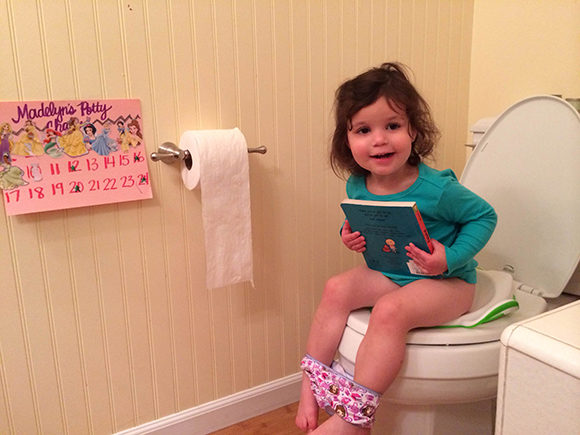 Reading The Potty Book on the potty. It's all so very meta. 