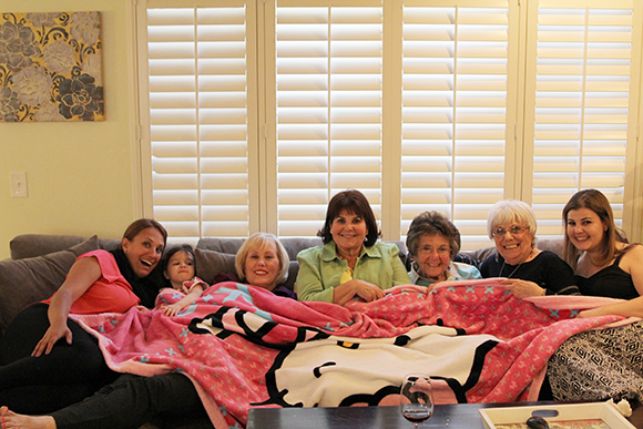 All the ladies of the group snuggled under the Hello Kitty blanket, per Madelyn's orders. 